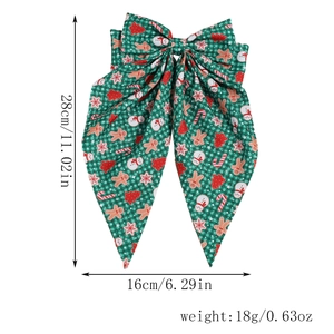 Green plaid Christmas bow clip detail with snowman prints and dimension labels