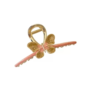 Elegant gold-plated butterfly hair claw clip with pink and tan marble patterns