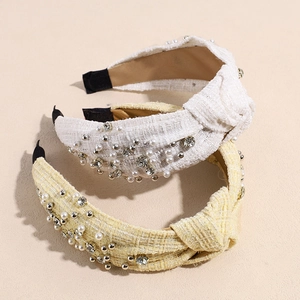 Fashionable tweed headband with pearls and rhinestones in a stylish knotted design