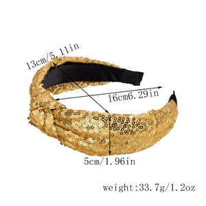 Detail view of 5cm wide knotted gold sequin headband with specific size and weight data