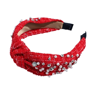 Red tweed knotted headband featuring white imitation pearls and sparkling rhinestones
