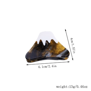 Macro detail of Mount Fuji hair claw clip showing precise dimensions and acetate texture