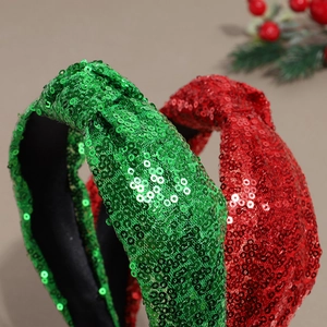 Sparkly knotted sequin Christmas headbands in red and green for festive hair styling