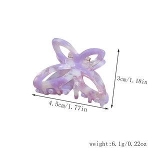 Detail view of acetate butterfly hair claw clip with measurements in white and purple