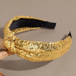 Sparkling gold sequin knotted headband with a wide retro holiday festive design