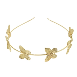 Serre-tête élégant en métal doré avec plusieurs motifs de papillons à texture mate