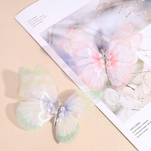 Barrettes papillon mobiles avec ailes en dégradé rose et violet et perles d'imitation