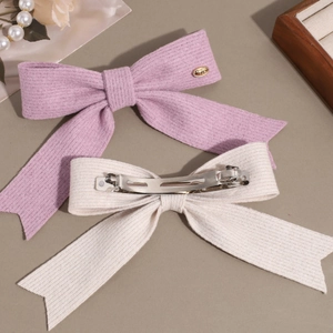Pinces à cheveux nœuds tricotés élégants en violet et beige avec de longs rubans et clips