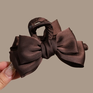 Elegant large brown satin bow hair claw clip with glossy finish for thick hair