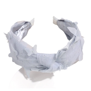 Light blue mesh knot headband with 3D butterfly appliqués on a clean white background