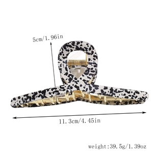 Detail showing dimensions of leopard print hair claw clip at 11.3cm length and 5cm height