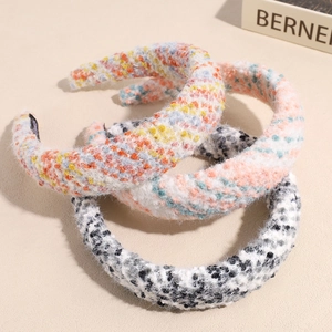 Three plush wide headbands in mixed colors with thick knitted texture for women