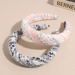 Chic tweed wide headbands in pink and black patterns with plush knit texture