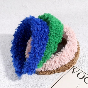 Plush faux fur headbands set in blue, green, pink, and brown for winter styling