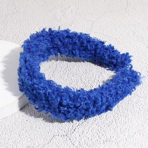 Detail of Klein blue fluffy teddy fleece headband with a thick, textured plush finish