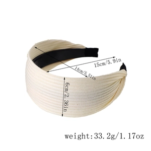 Detailed measurements of a wide cream pleated knitted headband with size and weight info