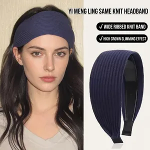 Fashionable dark blue wide knit headband with textured stripes for high crown effect