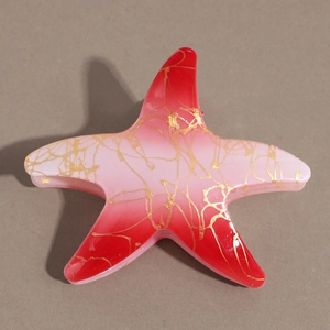 Détails de la pince à cheveux étoile de mer avec dégradé rouge et rose et fils dorés