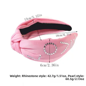 Detailed view of knotted headband with sparkling rhinestones and dimension labels