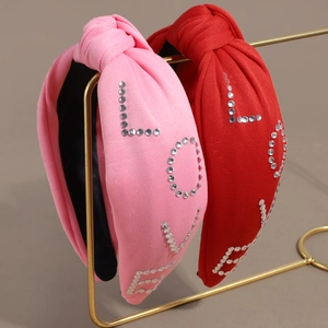 Elegant wide knotted headbands in red and pink with crystal LOVE lettering detail