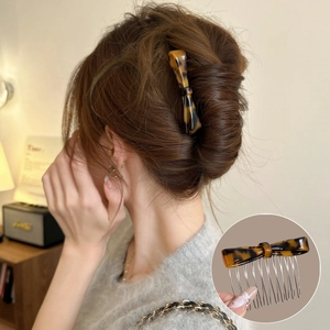 Elegant acetate bow hair comb with tortoiseshell pattern for sophisticated hairstyles