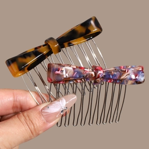 Elegant acetate bow hair combs in tortoiseshell and colorful tie-dye patterns with metal teeth