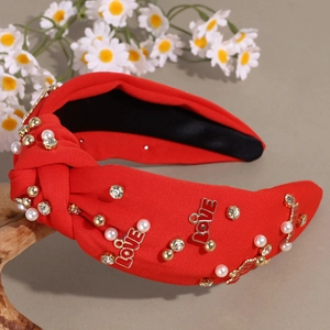 Red wide knotted headband with pearls, rhinestones and LOVE charms for Valentines Day