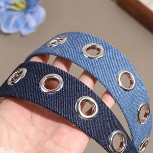 Denim wide headband with silver metal eyelet studs in dark blue and light blue colors