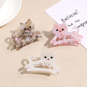 Pinces à cheveux chat en acétate avec texture marbrée et détails de strass