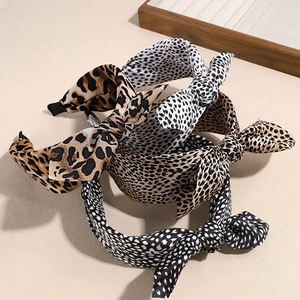 Leopard print bow headband set with stylish knot design and non-slip wide frame