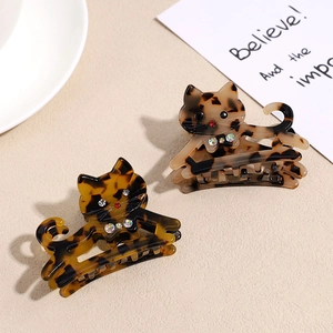 Pinces à cheveux chat en acétate avec motif écaille de tortue et strass étincelants