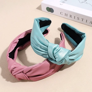 Fashionable PU leather headband set with wide knotted design in pink and mint green colors