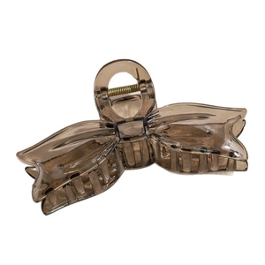Elegant large translucent brown bow hair claw clip with strong golden metal spring