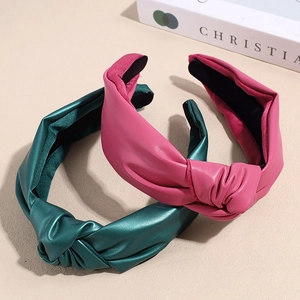 Minimalist wide knotted leather headbands in deep green and rose red colors