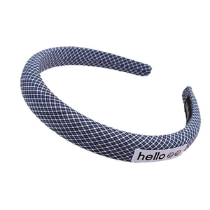 Blue and white gingham padded headband with a hello smile tag and thick fabric texture