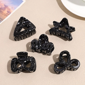 Five-piece set of black and white speckled star and triangle hair clips for high ponytail