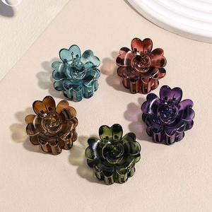 Set of five floral butterfly hair claw clips in assorted vintage translucent colors