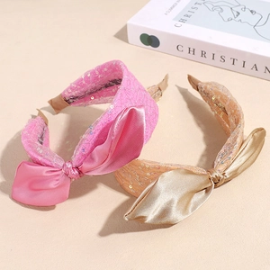 Elegante Haarreifen mit Pailletten und großen Satinschleifen in Rosa und Champagnergold