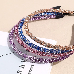 Set mit 4 glitzernden Strass-Haarreifen in Violett Rosa Blau und Goldfarben