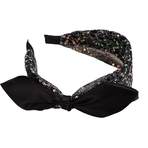 Glitzernder Haarreif mit Pailletten und großer schwarzer Satinschleife für Damen im Retro-Look