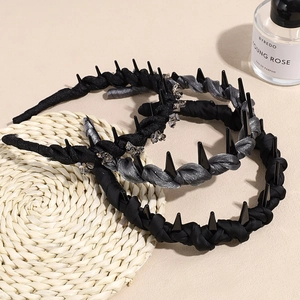 Braided non-slip headbands with rhinestone stars and mesh texture in black and gray tones