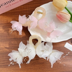Elegant set of two butterfly hair claws with organza wings and pearls in pink and white