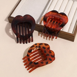 Minimalist heart hair combs in tortoise shell and amber resin finish for women