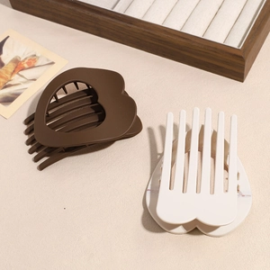 Minimalist matte heart hair clips in cream and coffee colors with strong grip
