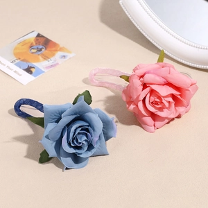 Elegant 3D rose flower hair clips in pink and blue silk fabric with clear alligator base