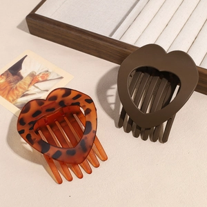 Set of two heart-shaped hair combs in tortoise shell and matte coffee brown resin