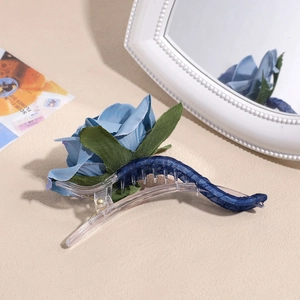 Elegant 3D light blue fabric rose hair clip with dark blue lace detail and clear duckbill grip