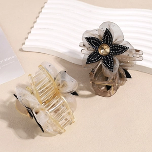 Elegant champagne gold mesh flower hair claw with sparkling rhinestones and organza petals