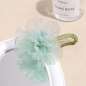 Elegant light green organza flower hair claw clip with white pearl bead accent for women