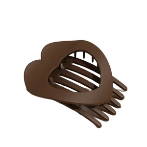 Matte brown heart-shaped hollow hair claw clip for women's hairstyle fixing